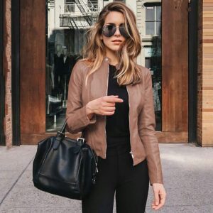women in brown leather jacket